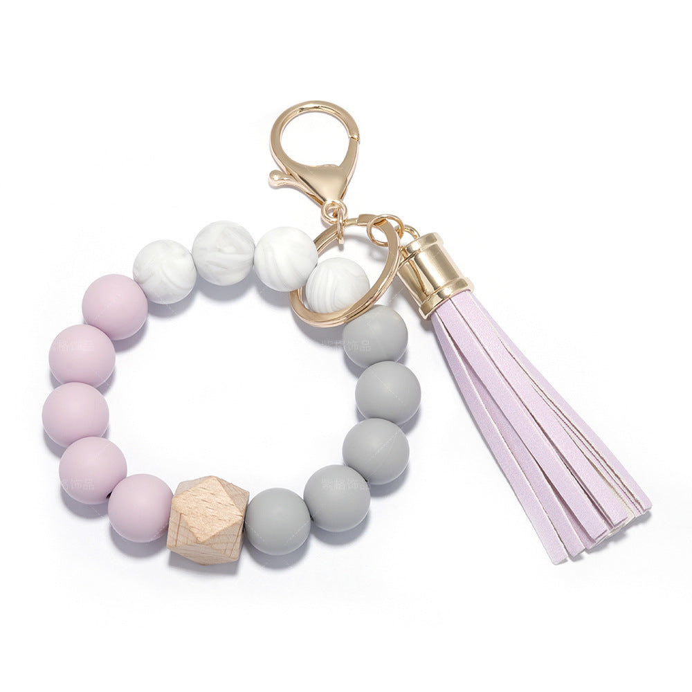 Venta al por mayor de silicona con cuentas de cuero PU borla pulsera pulsera